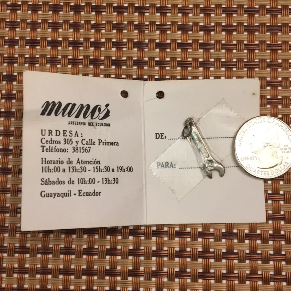 Wrench charm for bracelet.